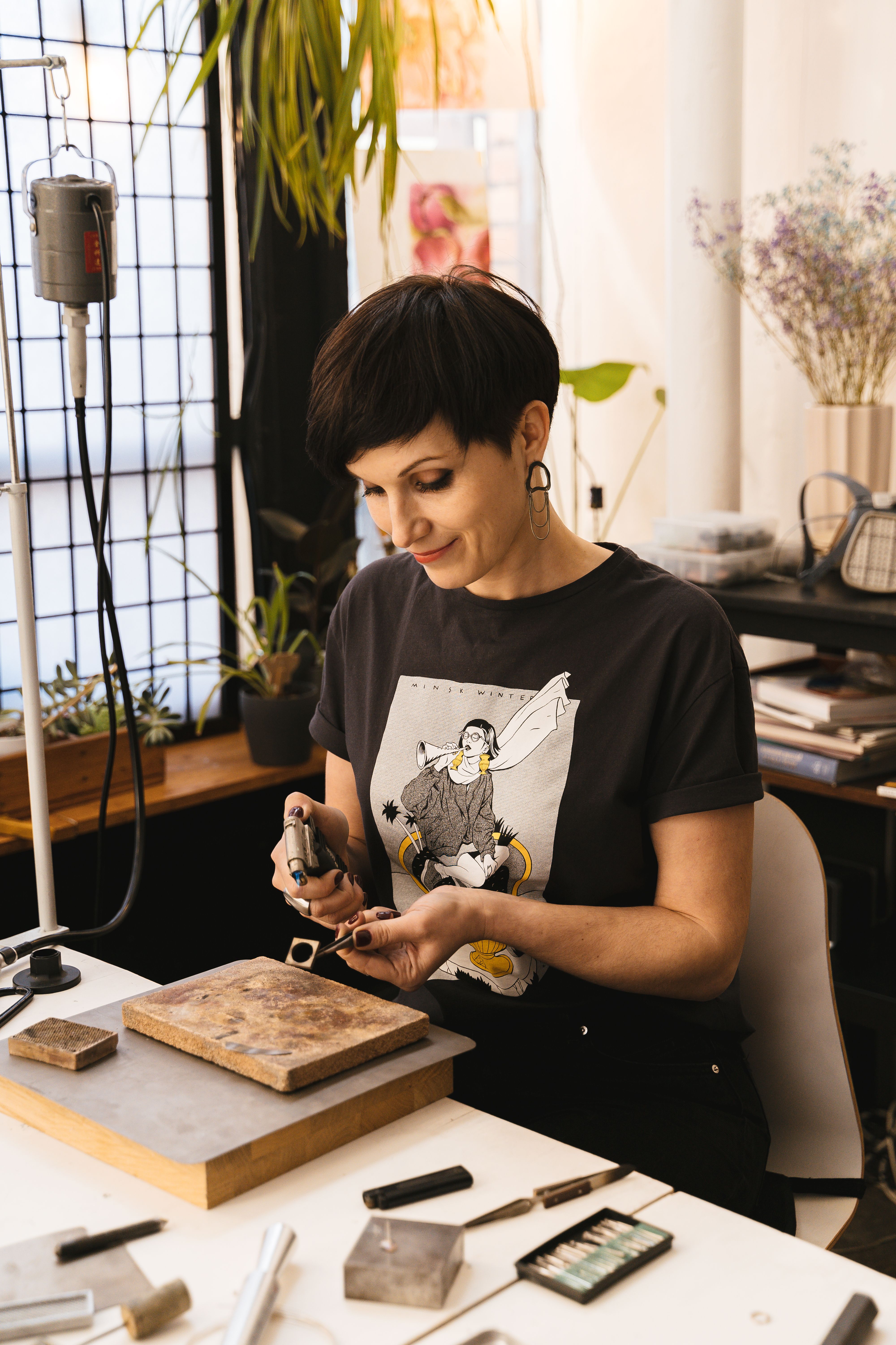 Independent maker working at a workshop bench